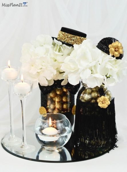 Roaring 20's Centerpiece  Rose gold party decor, Black and gold party  decorations, Black and gold centerpieces